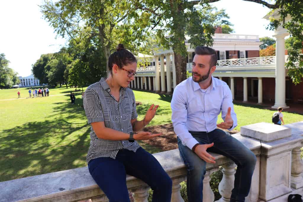 Two Young Professionals Keeping In Touch. Don't Start Marketing Until You Have Time To Communicate