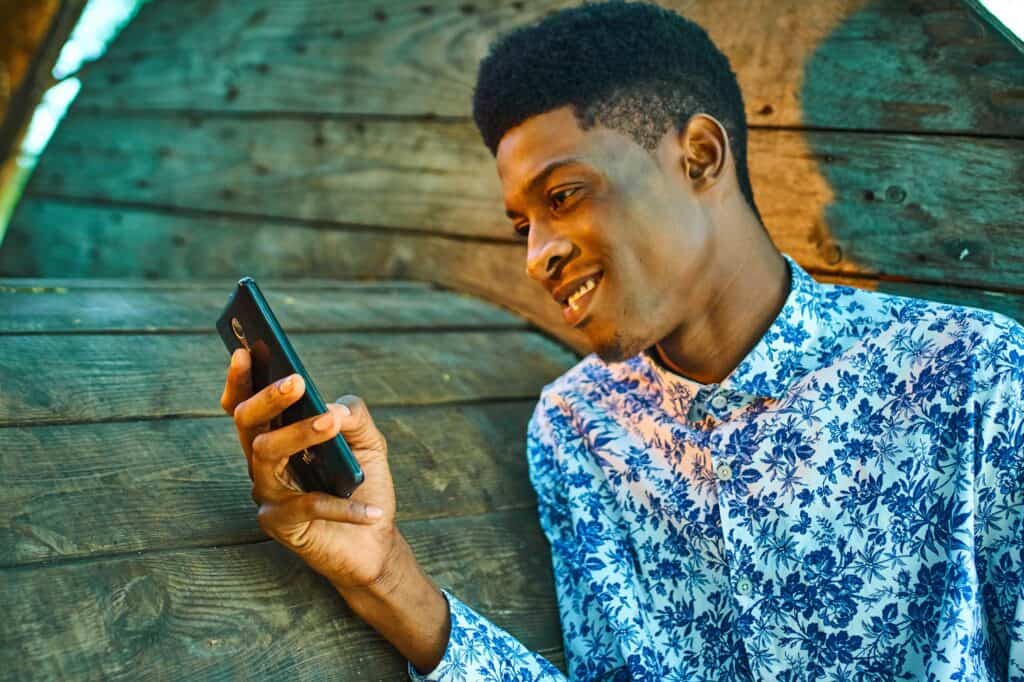 Young man using cell phone